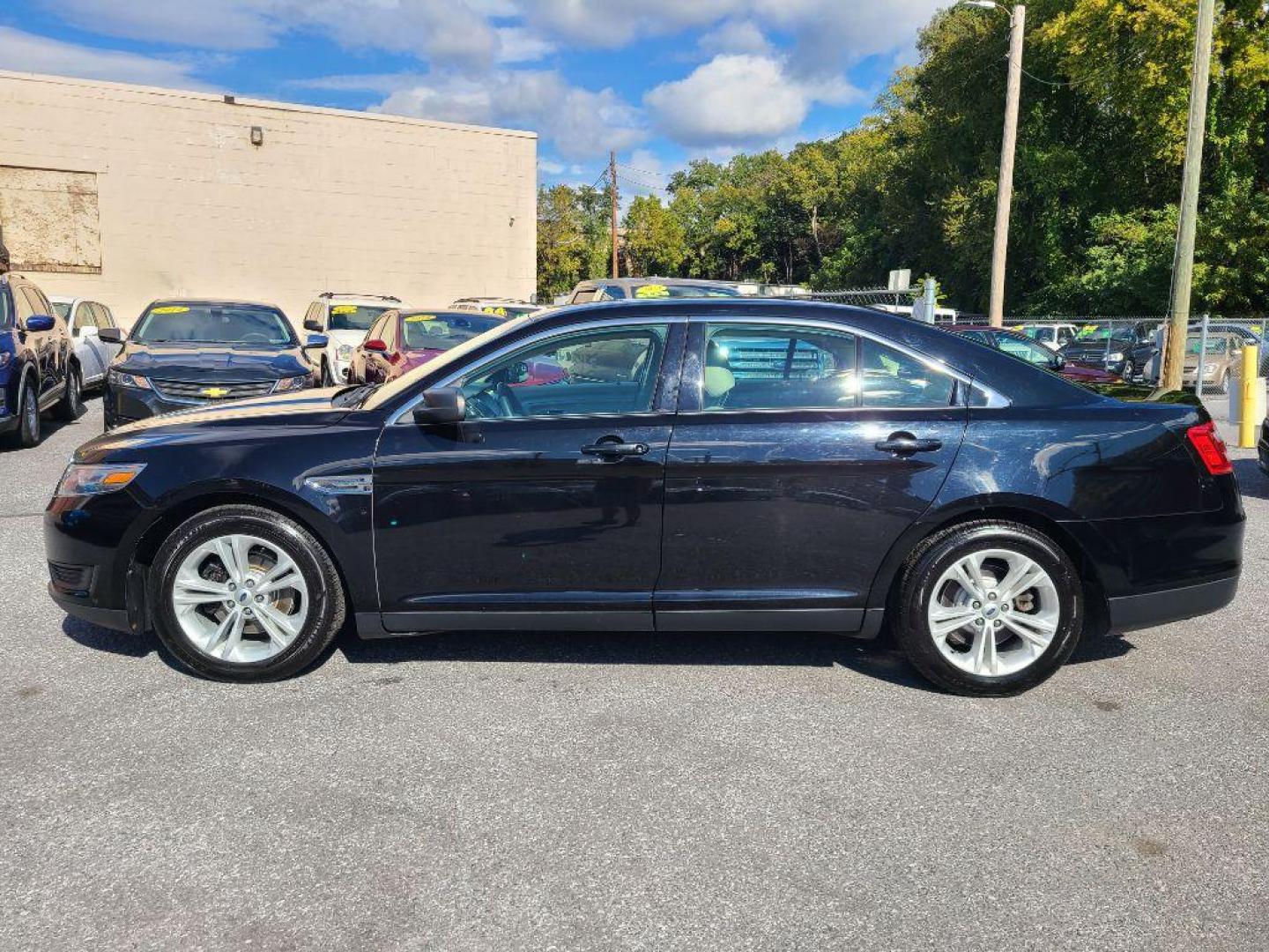 2016 BLACK FORD TAURUS SE (1FAHP2D8XGG) with an 3.5L engine, Automatic transmission, located at 117 North Cameron Street, Harrisburg, PA, 17101, (717) 963-8962, 40.266762, -76.875259 - WE FINANCE!!! Good Credit/ Bad Credit/ No Credit - ALL Trade-Ins Welcomed!!! ***Guaranteed Credit Approval*** APPLY ONLINE or CALL us TODAY ;) Please call us to discuss your cash and financing options. - Photo#1