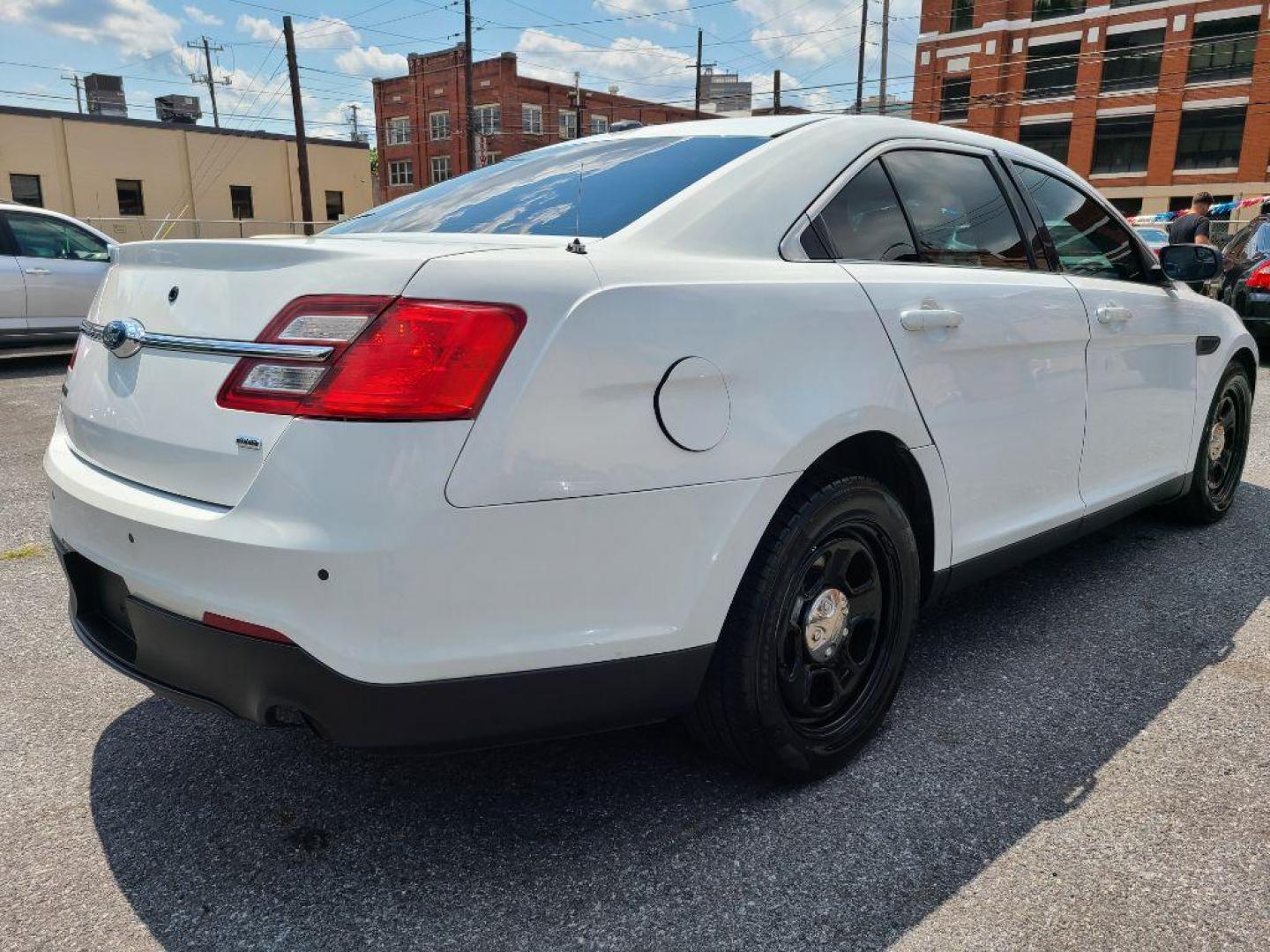 2016 WHITE FORD TAURUS POLICE INTERCEPTOR (1FAHP2MK4GG) with an 3.7L engine, Automatic transmission, located at 117 North Cameron Street, Harrisburg, PA, 17101, (717) 963-8962, 40.266762, -76.875259 - WE FINANCE!!! Good Credit/ Bad Credit/ No Credit - ALL Trade-Ins Welcomed!!! ***Guaranteed Credit Approval*** APPLY ONLINE or CALL us TODAY ;) Internet Prices and Marketplace Prices are SPECIAL discounted ***CASH DEALS*** Retail Prices are higher. Please call us to discuss your cash and finan - Photo#4