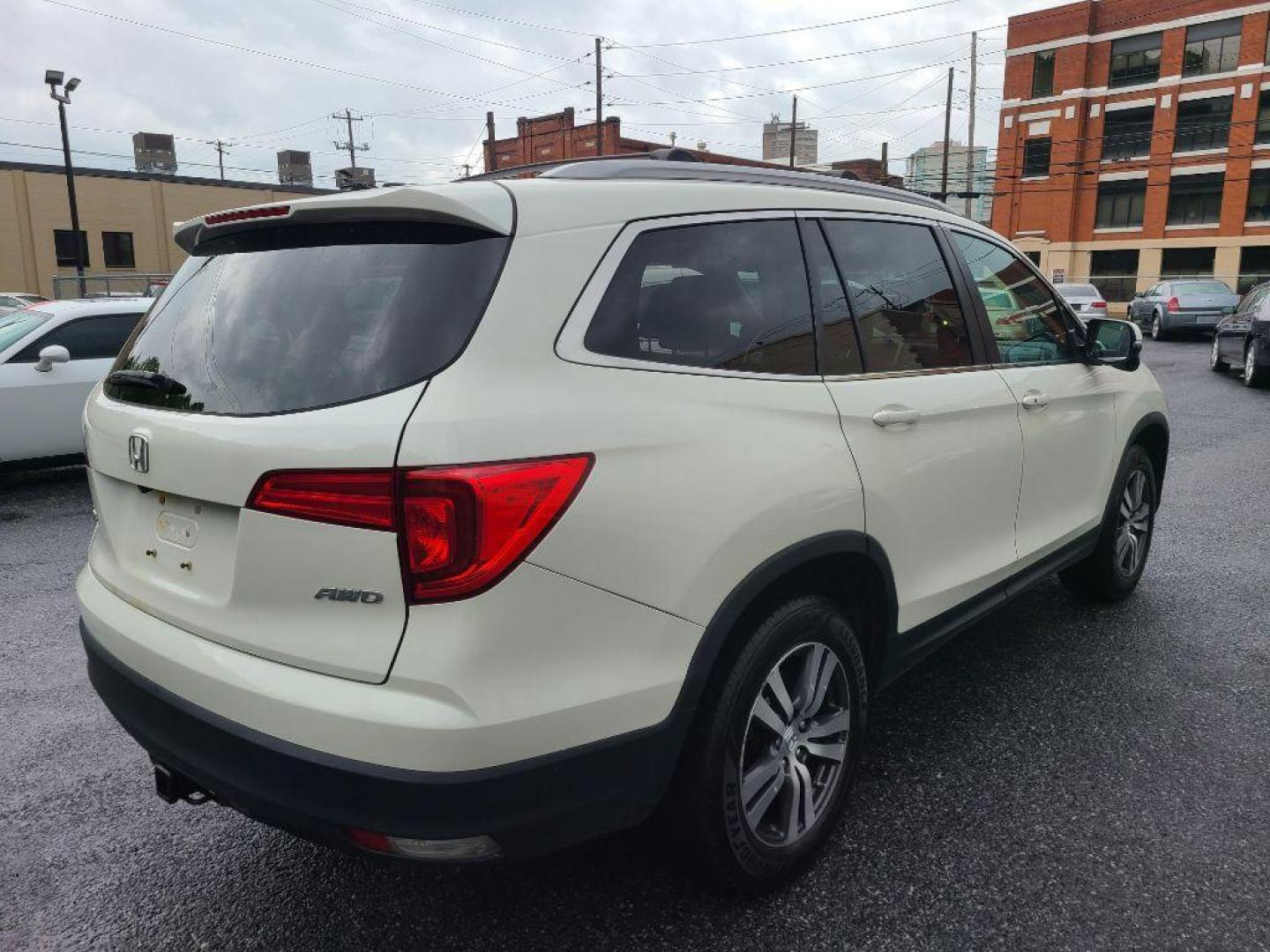2016 WHITE HONDA PILOT EXL (5FNYF6H5XGB) with an 3.5L engine, Automatic transmission, located at 7981 Paxton Street, Harrisburg, PA, 17111, (717) 561-2926, 40.261490, -76.749229 - WE FINANCE!!! Good Credit/ Bad Credit/ No Credit - ALL Trade-Ins Welcomed!!! ***Guaranteed Credit Approval*** APPLY ONLINE or CALL us TODAY ;) Internet Prices and Marketplace Prices are SPECIAL discounted ***CASH DEALS*** Retail Prices are higher. Please call us to discuss your cash and finan - Photo#4