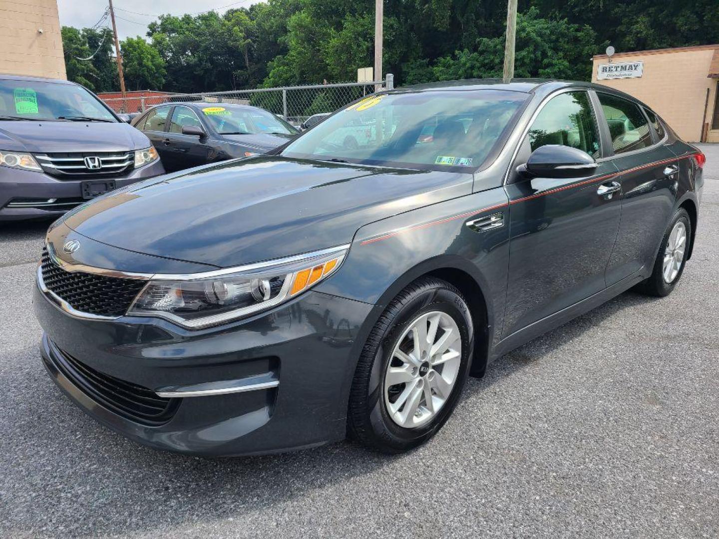 2016 GRAY KIA OPTIMA LX (KNAGT4L34G5) with an 2.4L engine, Automatic transmission, located at 117 North Cameron Street, Harrisburg, PA, 17101, (717) 963-8962, 40.266762, -76.875259 - WE FINANCE!!! Good Credit/ Bad Credit/ No Credit - ALL Trade-Ins Welcomed!!! ***Guaranteed Credit Approval*** APPLY ONLINE or CALL us TODAY ;) Internet Prices and Marketplace Prices are SPECIAL discounted ***CASH DEALS*** Retail Prices are higher. Please call us to discuss your cash and finan - Photo#0