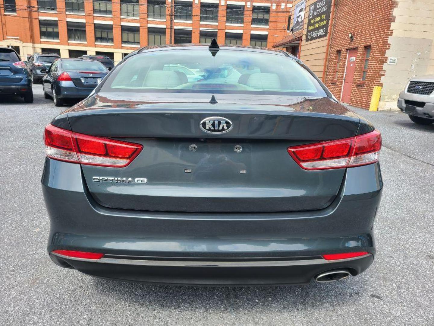 2016 GRAY KIA OPTIMA LX (KNAGT4L34G5) with an 2.4L engine, Automatic transmission, located at 117 North Cameron Street, Harrisburg, PA, 17101, (717) 963-8962, 40.266762, -76.875259 - WE FINANCE!!! Good Credit/ Bad Credit/ No Credit - ALL Trade-Ins Welcomed!!! ***Guaranteed Credit Approval*** APPLY ONLINE or CALL us TODAY ;) Internet Prices and Marketplace Prices are SPECIAL discounted ***CASH DEALS*** Retail Prices are higher. Please call us to discuss your cash and finan - Photo#3