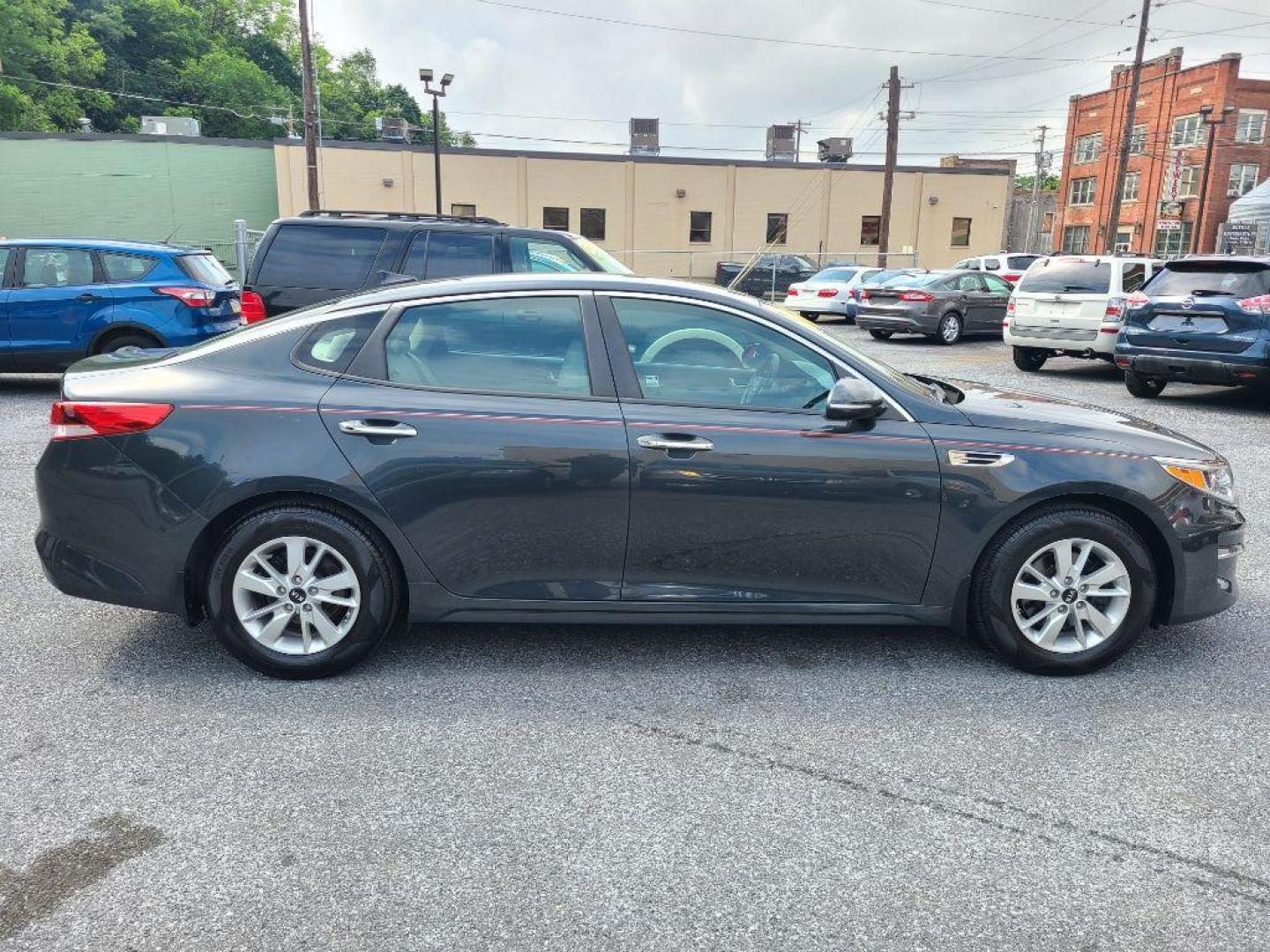 2016 GRAY KIA OPTIMA LX (KNAGT4L34G5) with an 2.4L engine, Automatic transmission, located at 117 North Cameron Street, Harrisburg, PA, 17101, (717) 963-8962, 40.266762, -76.875259 - WE FINANCE!!! Good Credit/ Bad Credit/ No Credit - ALL Trade-Ins Welcomed!!! ***Guaranteed Credit Approval*** APPLY ONLINE or CALL us TODAY ;) Internet Prices and Marketplace Prices are SPECIAL discounted ***CASH DEALS*** Retail Prices are higher. Please call us to discuss your cash and finan - Photo#5