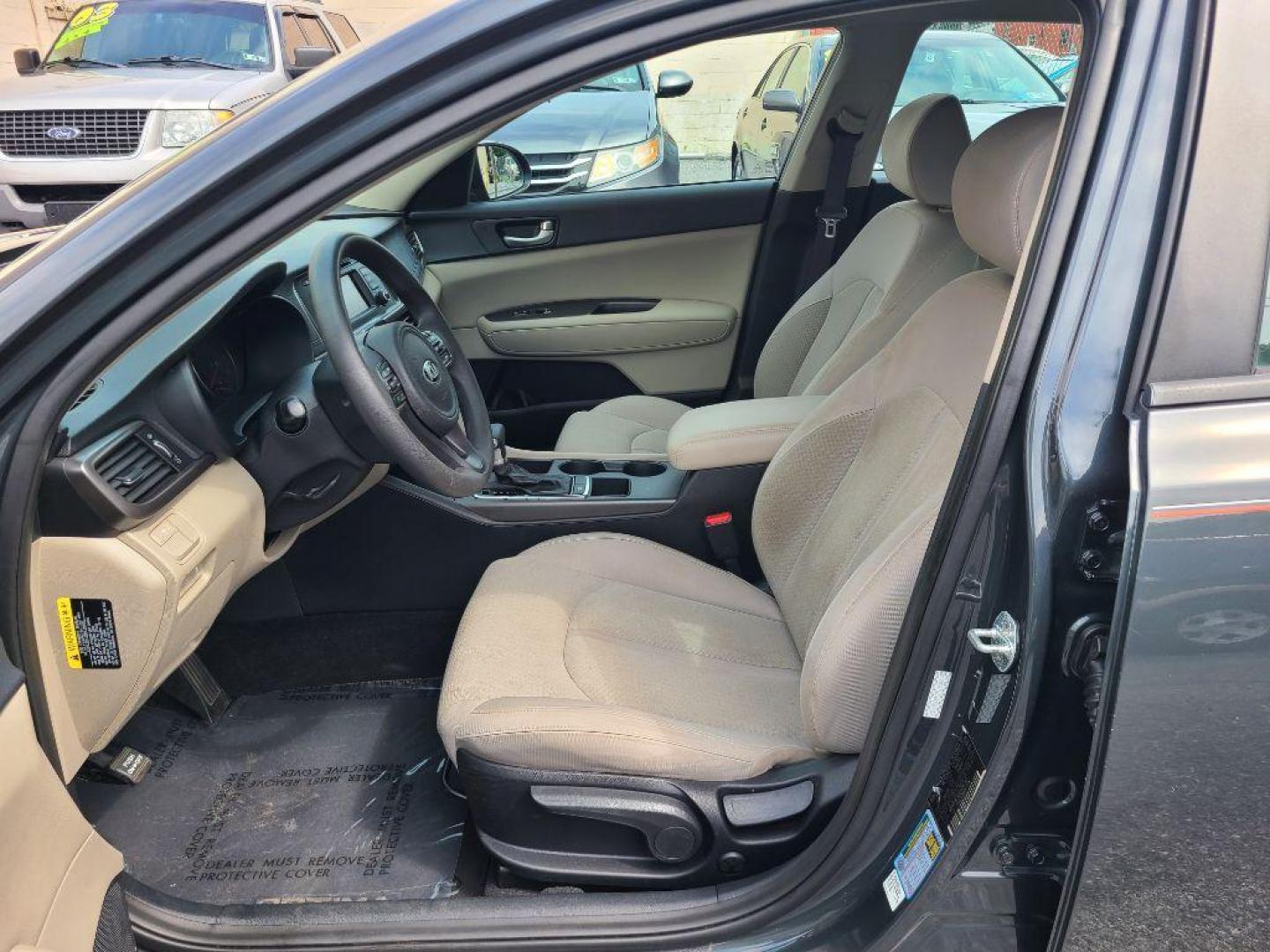 2016 GRAY KIA OPTIMA LX (KNAGT4L34G5) with an 2.4L engine, Automatic transmission, located at 117 North Cameron Street, Harrisburg, PA, 17101, (717) 963-8962, 40.266762, -76.875259 - WE FINANCE!!! Good Credit/ Bad Credit/ No Credit - ALL Trade-Ins Welcomed!!! ***Guaranteed Credit Approval*** APPLY ONLINE or CALL us TODAY ;) Internet Prices and Marketplace Prices are SPECIAL discounted ***CASH DEALS*** Retail Prices are higher. Please call us to discuss your cash and finan - Photo#8