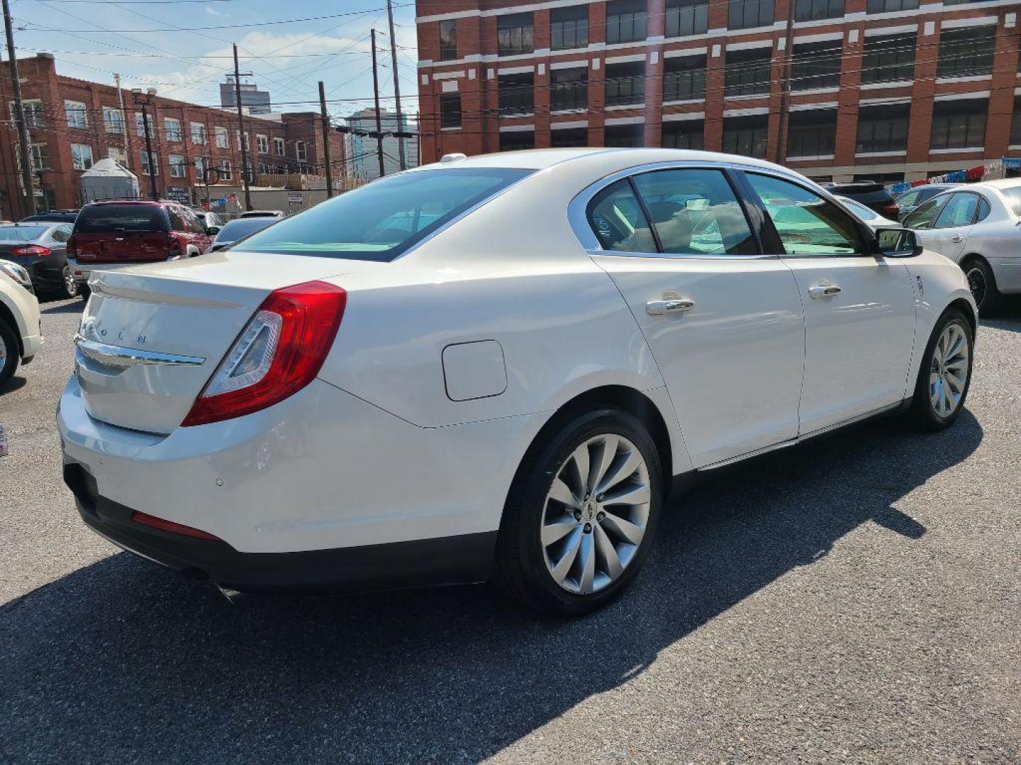 2016 WHITE LINCOLN MKS SDN (1LNHL9EK8GG) with an 3.7L engine, Automatic transmission, located at 117 North Cameron Street, Harrisburg, PA, 17101, (717) 963-8962, 40.266762, -76.875259 - WE FINANCE!!! Good Credit/ Bad Credit/ No Credit - ALL Trade-Ins Welcomed!!! ***Guaranteed Credit Approval*** APPLY ONLINE or CALL us TODAY ;) Internet Prices and Marketplace Prices are SPECIAL discounted ***CASH DEALS*** Retail Prices are higher. Please call us to discuss your cash and finan - Photo#4