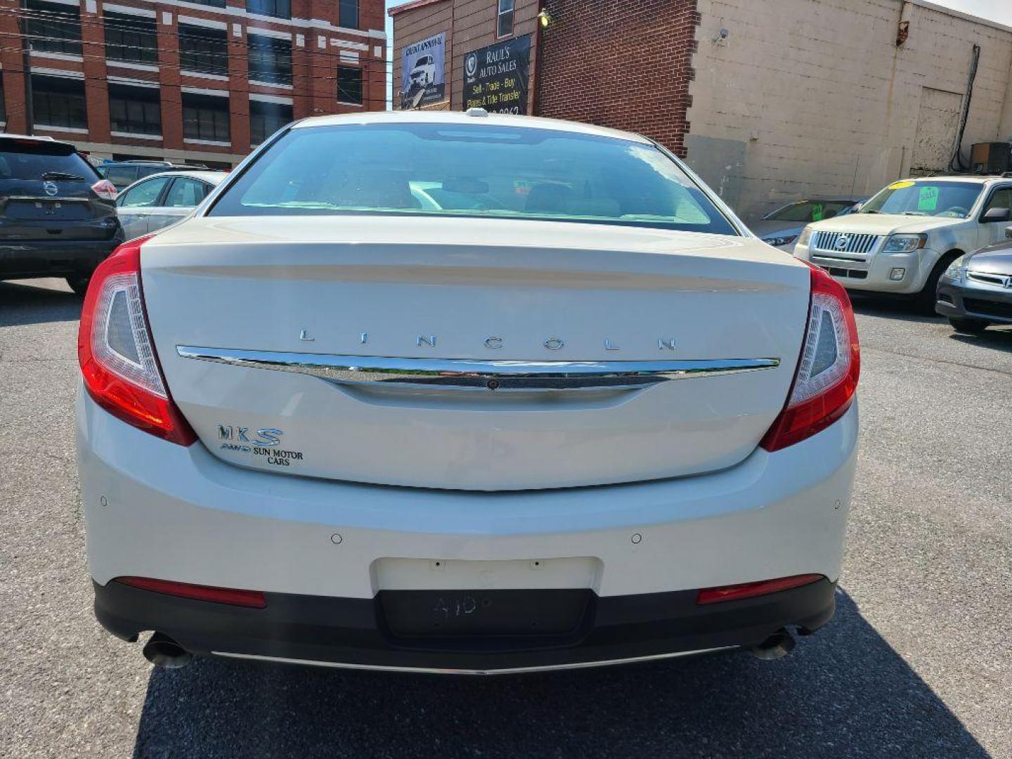 2016 WHITE LINCOLN MKS SDN (1LNHL9EK8GG) with an 3.7L engine, Automatic transmission, located at 117 North Cameron Street, Harrisburg, PA, 17101, (717) 963-8962, 40.266762, -76.875259 - WE FINANCE!!! Good Credit/ Bad Credit/ No Credit - ALL Trade-Ins Welcomed!!! ***Guaranteed Credit Approval*** APPLY ONLINE or CALL us TODAY ;) Internet Prices and Marketplace Prices are SPECIAL discounted ***CASH DEALS*** Retail Prices are higher. Please call us to discuss your cash and finan - Photo#3