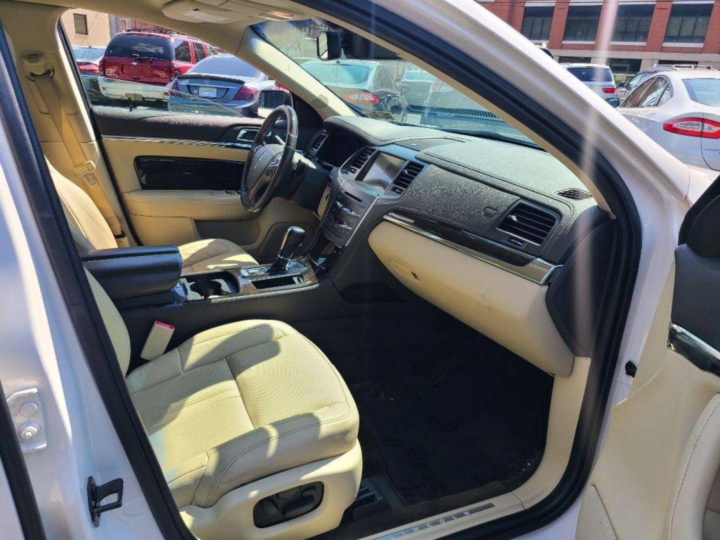 2016 WHITE LINCOLN MKS SDN (1LNHL9EK8GG) with an 3.7L engine, Automatic transmission, located at 117 North Cameron Street, Harrisburg, PA, 17101, (717) 963-8962, 40.266762, -76.875259 - WE FINANCE!!! Good Credit/ Bad Credit/ No Credit - ALL Trade-Ins Welcomed!!! ***Guaranteed Credit Approval*** APPLY ONLINE or CALL us TODAY ;) Internet Prices and Marketplace Prices are SPECIAL discounted ***CASH DEALS*** Retail Prices are higher. Please call us to discuss your cash and finan - Photo#11