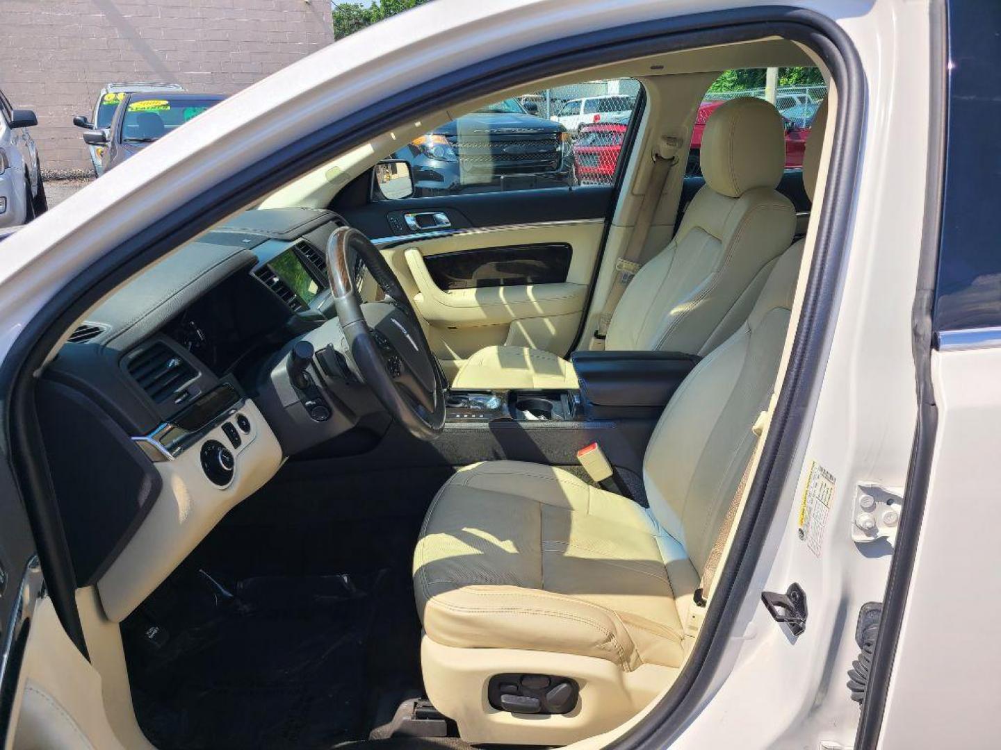 2016 WHITE LINCOLN MKS SDN (1LNHL9EK8GG) with an 3.7L engine, Automatic transmission, located at 117 North Cameron Street, Harrisburg, PA, 17101, (717) 963-8962, 40.266762, -76.875259 - WE FINANCE!!! Good Credit/ Bad Credit/ No Credit - ALL Trade-Ins Welcomed!!! ***Guaranteed Credit Approval*** APPLY ONLINE or CALL us TODAY ;) Internet Prices and Marketplace Prices are SPECIAL discounted ***CASH DEALS*** Retail Prices are higher. Please call us to discuss your cash and finan - Photo#12