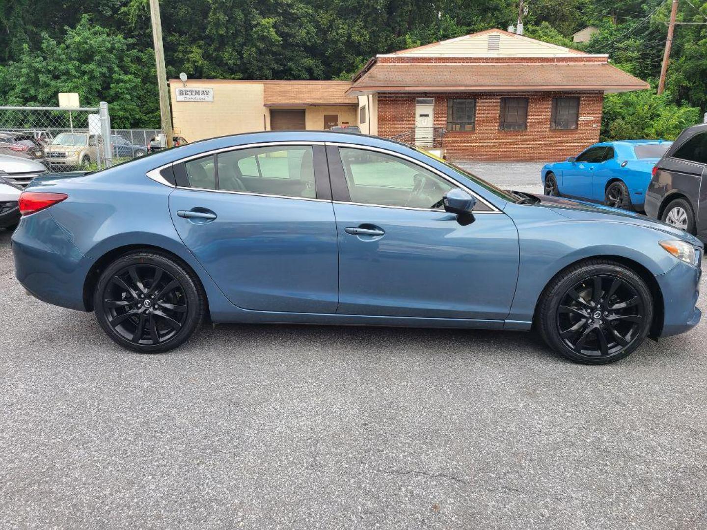 2016 BLUE MAZDA 6 TOURING (JM1GJ1V59G1) with an 2.5L engine, Automatic transmission, located at 117 North Cameron Street, Harrisburg, PA, 17101, (717) 963-8962, 40.266762, -76.875259 - WE FINANCE!!! Good Credit/ Bad Credit/ No Credit - ALL Trade-Ins Welcomed!!! ***Guaranteed Credit Approval*** APPLY ONLINE or CALL us TODAY ;) Internet Prices and Marketplace Prices are SPECIAL discounted ***CASH DEALS*** Retail Prices are higher. Please call us to discuss your cash and finan - Photo#5