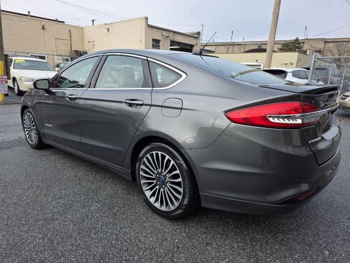 2017 GRAY FORD FUSION TITANIUM HEV (3FA6P0RU8HR) with an 2.0L engine, Continuously Variable transmission, located at 117 North Cameron Street, Harrisburg, PA, 17101, (717) 963-8962, 40.266762, -76.875259 - WE FINANCE!!! Good Credit/ Bad Credit/ No Credit - ALL Trade-Ins Welcomed!!! ***Guaranteed Credit Approval*** APPLY ONLINE or CALL us TODAY ;) Please call us to discuss your cash and financing options. - Photo#2