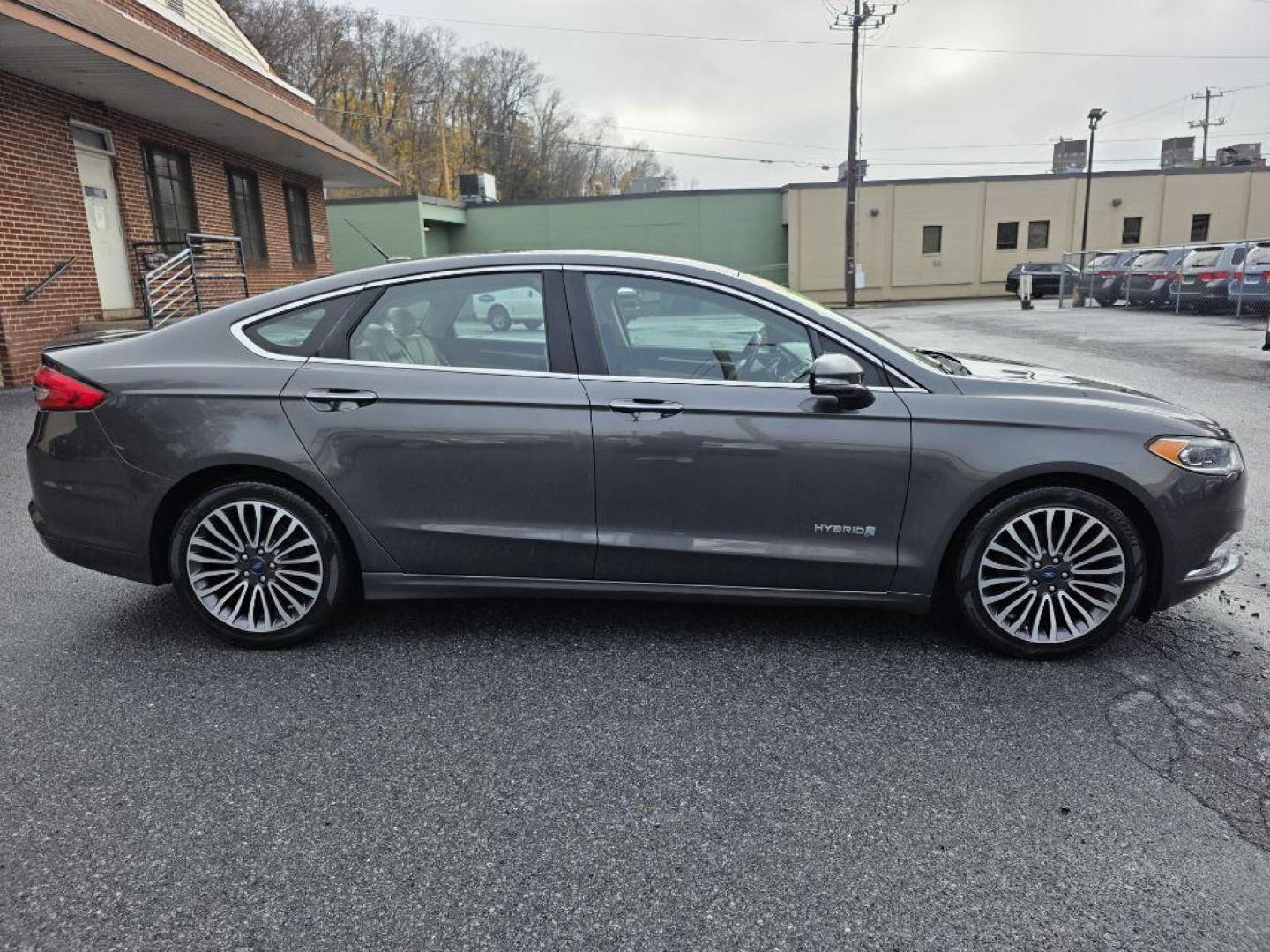 2017 GRAY FORD FUSION TITANIUM HEV (3FA6P0RU8HR) with an 2.0L engine, Continuously Variable transmission, located at 117 North Cameron Street, Harrisburg, PA, 17101, (717) 963-8962, 40.266762, -76.875259 - WE FINANCE!!! Good Credit/ Bad Credit/ No Credit - ALL Trade-Ins Welcomed!!! ***Guaranteed Credit Approval*** APPLY ONLINE or CALL us TODAY ;) Please call us to discuss your cash and financing options. - Photo#12