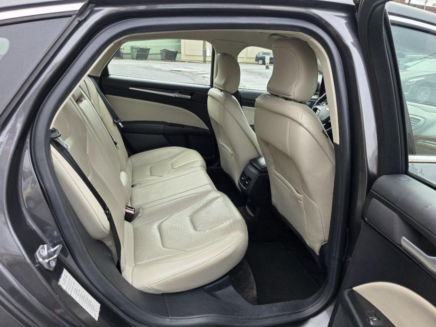 2017 GRAY FORD FUSION TITANIUM HEV (3FA6P0RU8HR) with an 2.0L engine, Continuously Variable transmission, located at 117 North Cameron Street, Harrisburg, PA, 17101, (717) 963-8962, 40.266762, -76.875259 - WE FINANCE!!! Good Credit/ Bad Credit/ No Credit - ALL Trade-Ins Welcomed!!! ***Guaranteed Credit Approval*** APPLY ONLINE or CALL us TODAY ;) Please call us to discuss your cash and financing options. - Photo#15