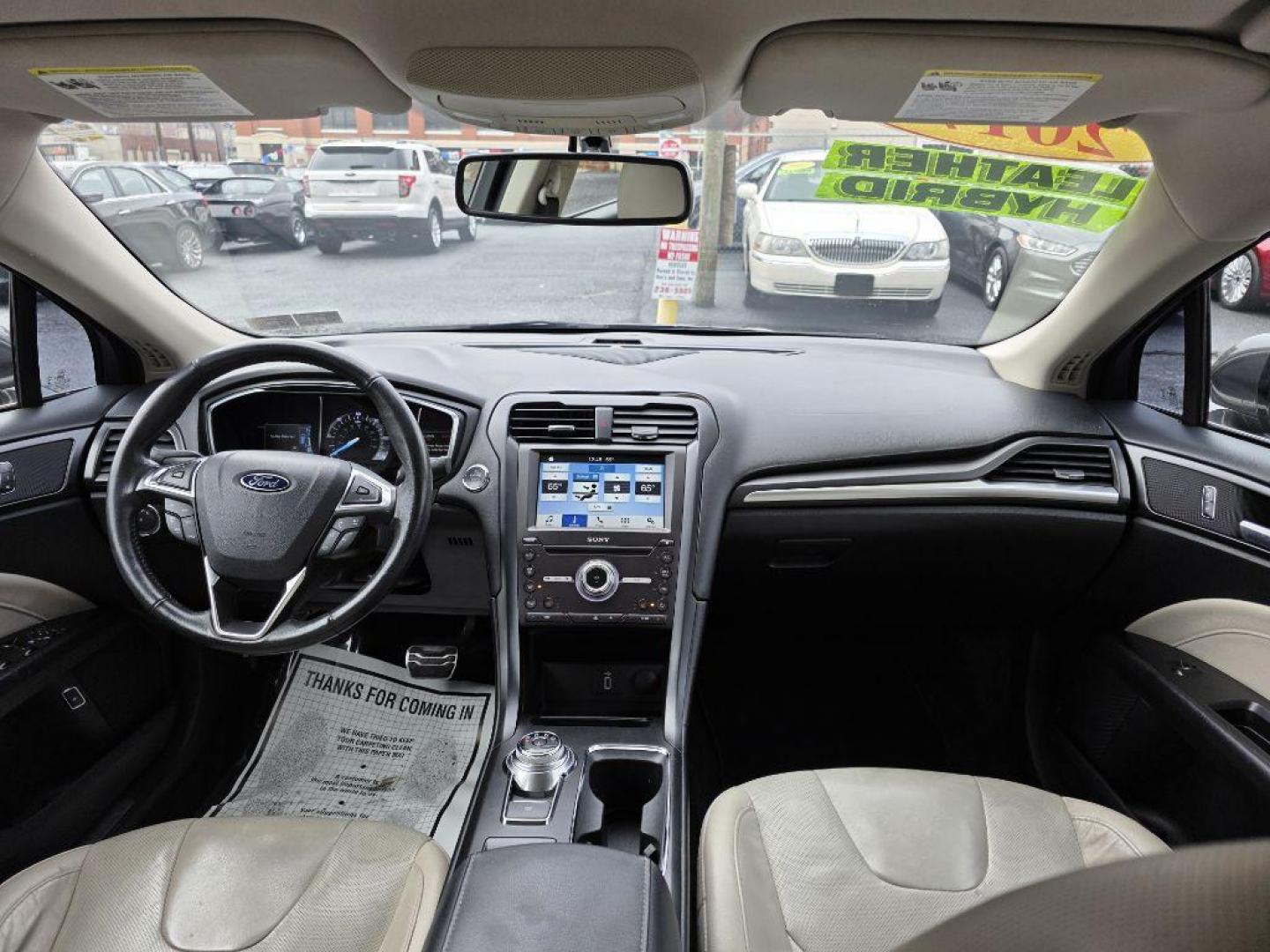 2017 GRAY FORD FUSION TITANIUM HEV (3FA6P0RU8HR) with an 2.0L engine, Continuously Variable transmission, located at 117 North Cameron Street, Harrisburg, PA, 17101, (717) 963-8962, 40.266762, -76.875259 - WE FINANCE!!! Good Credit/ Bad Credit/ No Credit - ALL Trade-Ins Welcomed!!! ***Guaranteed Credit Approval*** APPLY ONLINE or CALL us TODAY ;) Please call us to discuss your cash and financing options. - Photo#16