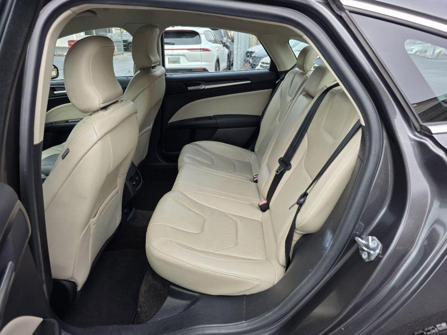 2017 GRAY FORD FUSION TITANIUM HEV (3FA6P0RU8HR) with an 2.0L engine, Continuously Variable transmission, located at 117 North Cameron Street, Harrisburg, PA, 17101, (717) 963-8962, 40.266762, -76.875259 - WE FINANCE!!! Good Credit/ Bad Credit/ No Credit - ALL Trade-Ins Welcomed!!! ***Guaranteed Credit Approval*** APPLY ONLINE or CALL us TODAY ;) Please call us to discuss your cash and financing options. - Photo#17