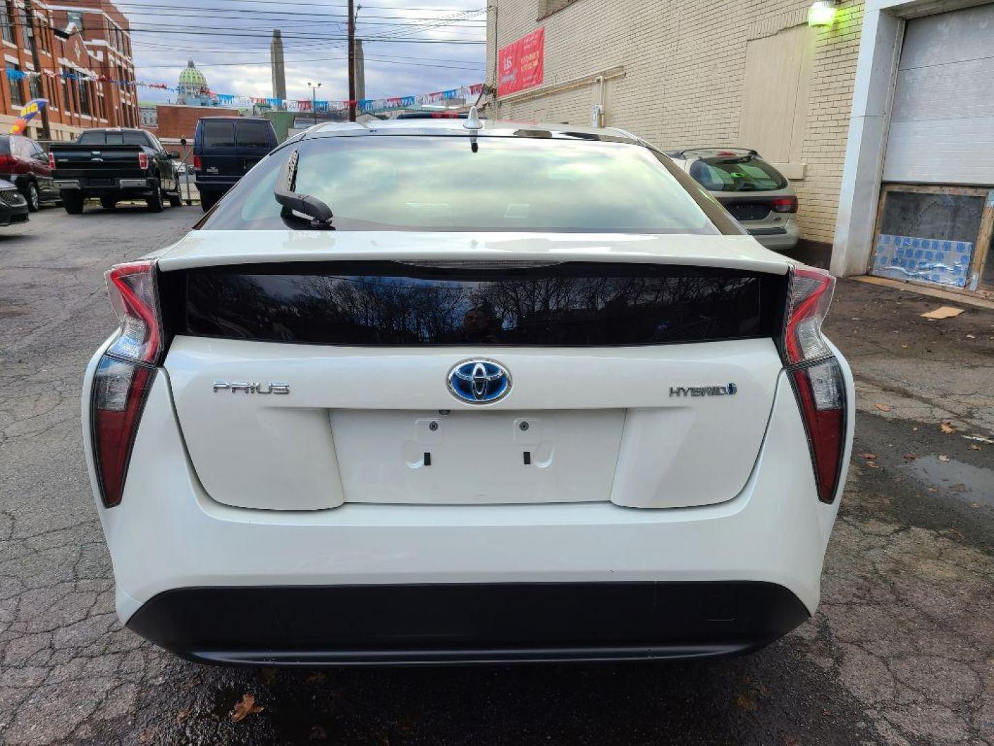 2017 WHITE TOYOTA PRIUS FOUR HATCHBACK (JTDKARFU6H3) with an 1.8L engine, Continuously Variable transmission, located at 7981 Paxton Street, Harrisburg, PA, 17111, (717) 561-2926, 40.261490, -76.749229 - WE FINANCE!!! Good Credit/ Bad Credit/ No Credit - ALL Trade-Ins Welcomed!!! ***Guaranteed Credit Approval*** APPLY ONLINE or CALL us TODAY ;) Internet Prices and Marketplace Prices are SPECIAL discounted ***CASH DEALS*** Retail Prices are higher. Please call us to discuss your cash and finan - Photo#3