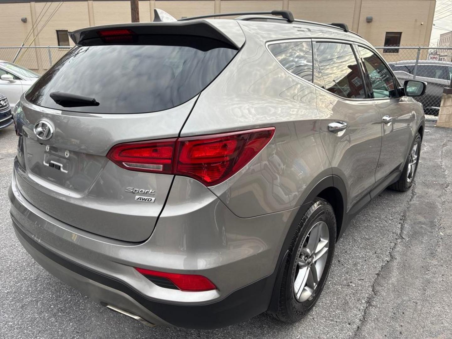 2018 GRAY HYUNDAI SANTA FE SPORT SUV (5XYZUDLB0JG) with an 2.4L engine, Automatic transmission, located at 117 North Cameron Street, Harrisburg, PA, 17101, (717) 963-8962, 40.266762, -76.875259 - WE FINANCE!!! Good Credit/ Bad Credit/ No Credit - ALL Trade-Ins Welcomed!!! ***Guaranteed Credit Approval*** APPLY ONLINE or CALL us TODAY ;) Please call us to discuss your cash and financing options. - Photo#5