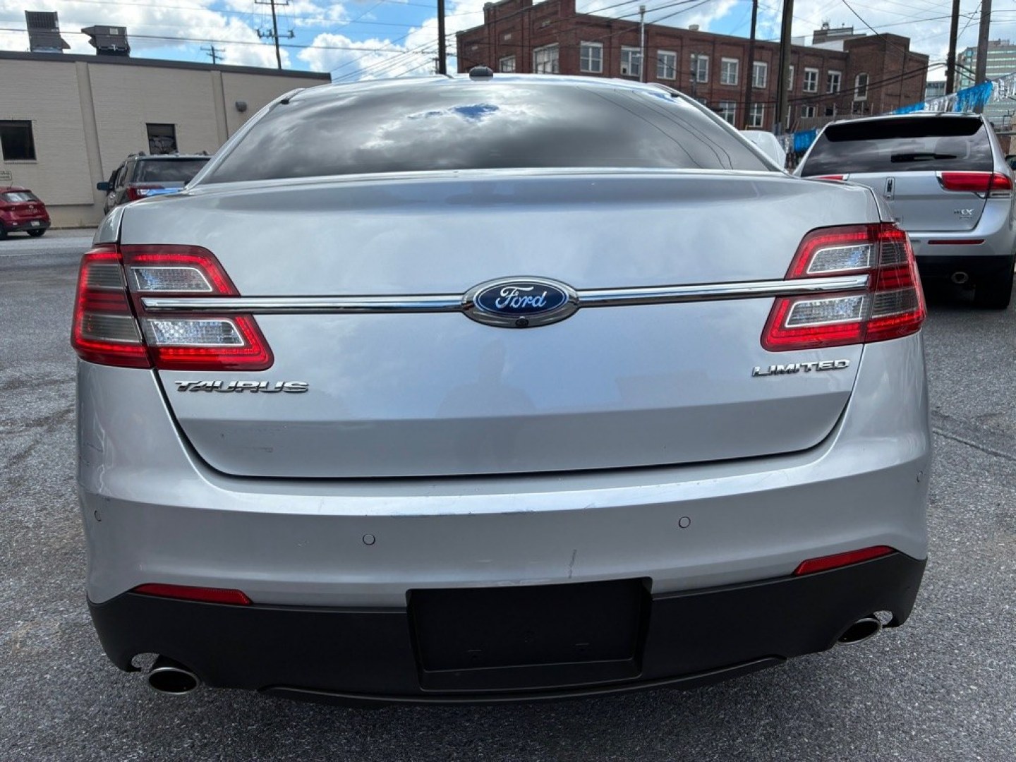 2019 SILVER FORD TAURUS LIMITED (1FAHP2F81KG) with an 3.5L engine, Automatic transmission, located at 117 North Cameron Street, Harrisburg, PA, 17101, (717) 963-8962, 40.266762, -76.875259 - Value Added Options - Installed Navigation System Sun/Moonroof Value Added Options - Standard Automatic Highbeams Auxiliary Audio Input Back-Up Camera Blind Spot Monitor Bluetooth Connection Cooled Front Seat Cross-Traffic Alert Dual A/C Hands-Free Liftgate Heated Front Seat Heated M- Photo#3